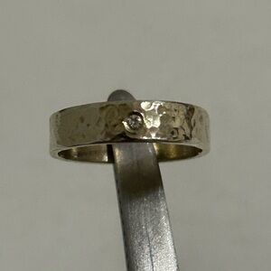Handcrafted hammered wide band/ring with diamond